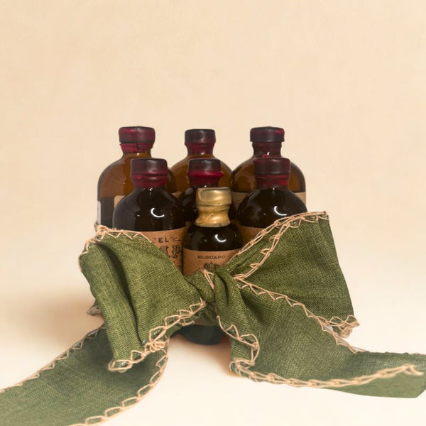 El Guapo Bourbon Lovers Collection bitters gift set box with a decorative bow.