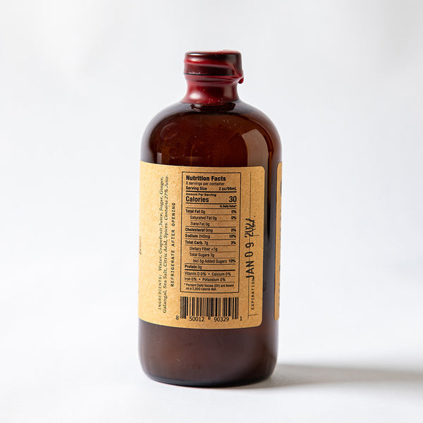Side profile of El Guapo Bloody Mary Mixer with nutritional panel on a white background