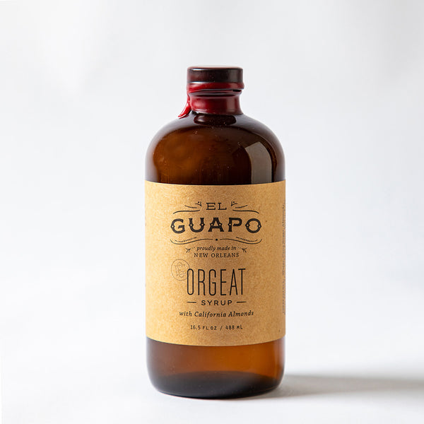16.5 oz large bottle of El Guapo Orgeat Syrup on a white background