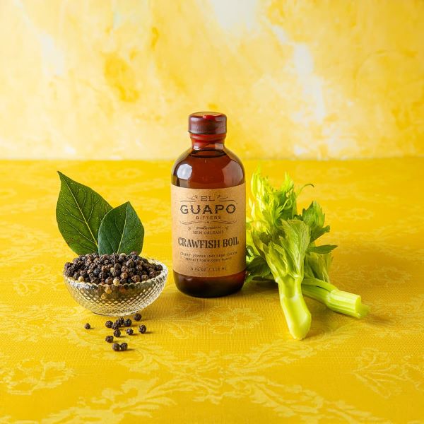 El Guapo Crawfish Boil Bitters bottle with celery and black peppercorns