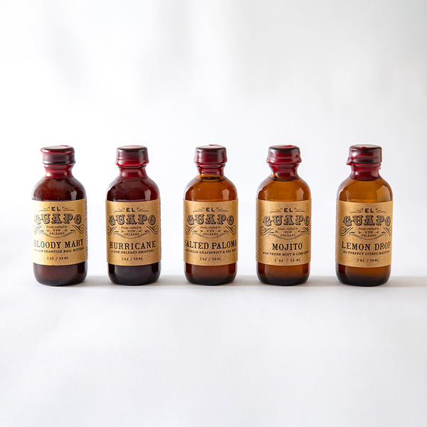 Five bottles of El Guapo Single Serving Mixers on a white background