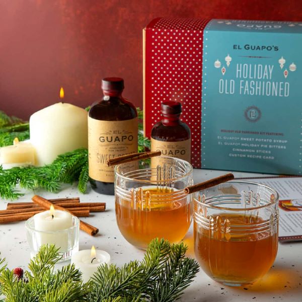 El Guapo Holiday Old Fashioned Kit with bottles, mixer, and recipe card.