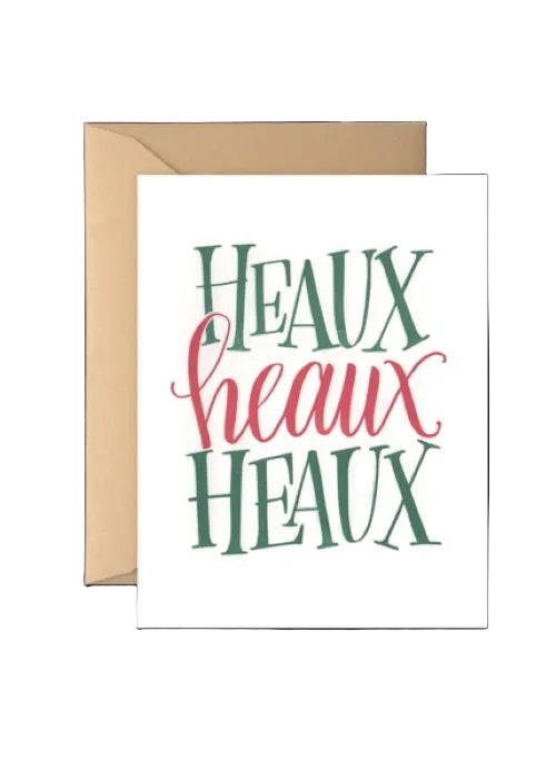 Heaux Heaux Heaux holiday greeting card with red and green typography.