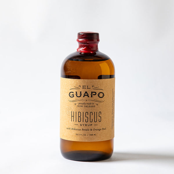 Large 16.5 oz Bottle of El Guapo Hibiscus Syrup on a white background