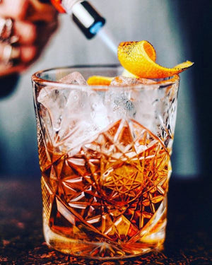 The Full Monte smoky mezcal cocktail with bitters.