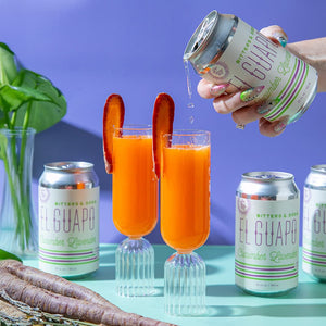 Spiritless Carrot Stick non-alcoholic mocktail being poured with El Guapo Cucumber Lavender soda