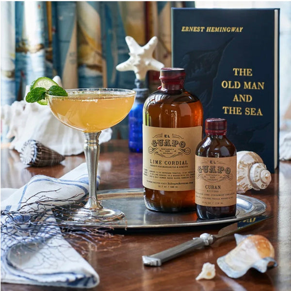 Old Cuban cocktail with El Guapo Lime Cordial and a copy of The Old Man and the Sea