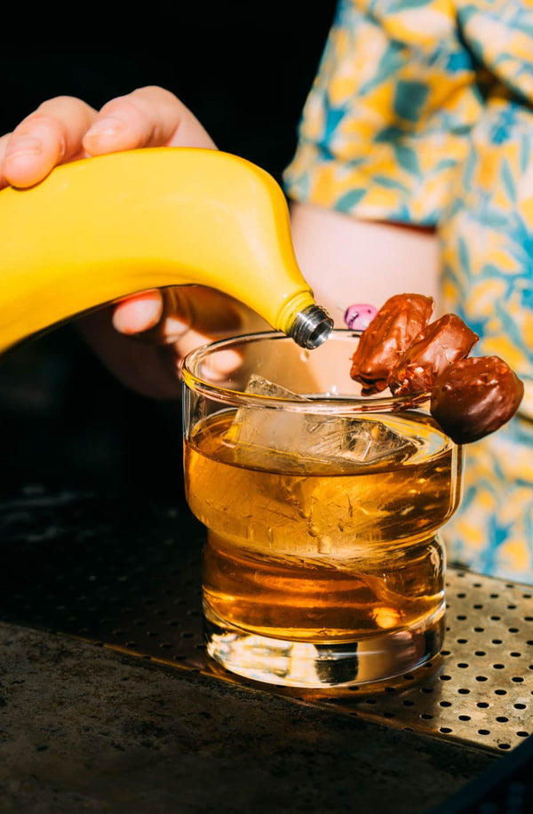 Planet of the Apes banana rum cocktail from Tiki Chick featuring El Guapo Vanilla and Chocolate Bitters.