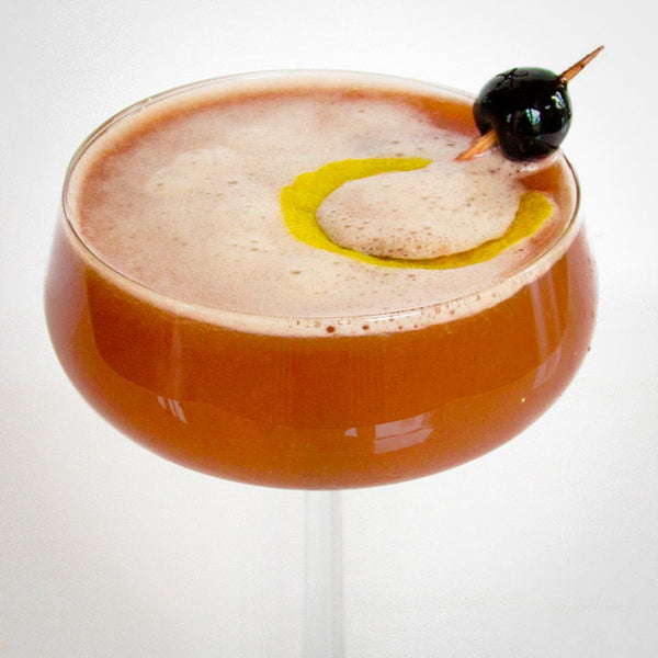rumours-7Rumours pisco cocktail in a coupe glass topped with foam and a lemon twist20x720-recipe