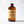 Bottle of large El Guapo Candy Cane Syrup on a white background
