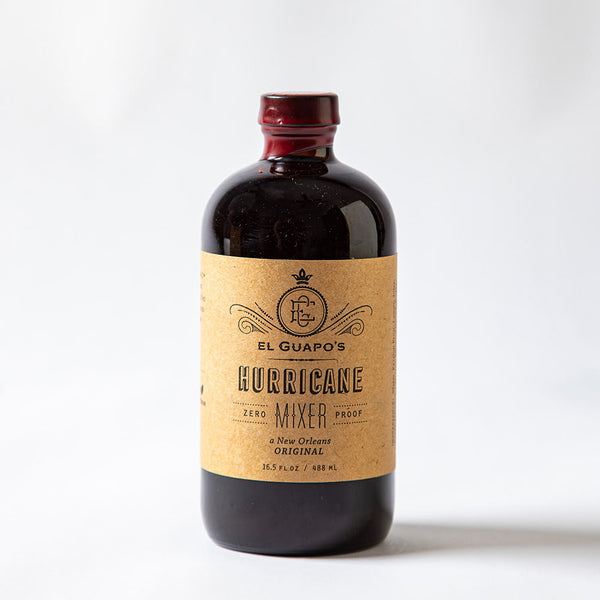 Glass Bottle of full size El Guapo Hurricane Mixer on a white background