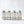 Four cans of El Guapo Love Potion bitters & soda on a white background