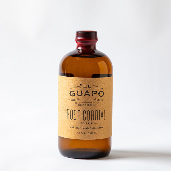 16.5 oz bottle of El Guapo Rose Cordial Syrup on a white background