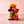 8.5 oz Bottle of El Guapo Rose Cordial syrup with roses on a pink background
