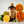 Large bottle of El Guapo Tonic Syrup with citrus fruits on a light background