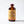 Small bottle of El Guapo Sweet Potato Syrup on a white background