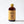 Bottle of small El Guapo Tonic Syrup on a white background